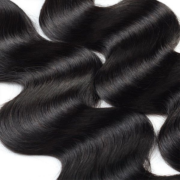 Paquets de cheveux vierges avec boucles en vague et une lace 13*4